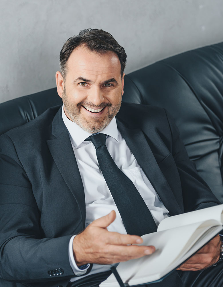 Smart Asian Business Man smiling in Office
